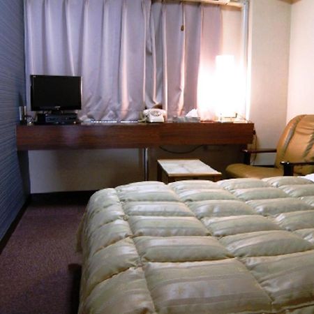 Business Hotel Tenmonkan Kagoshima Bagian luar foto