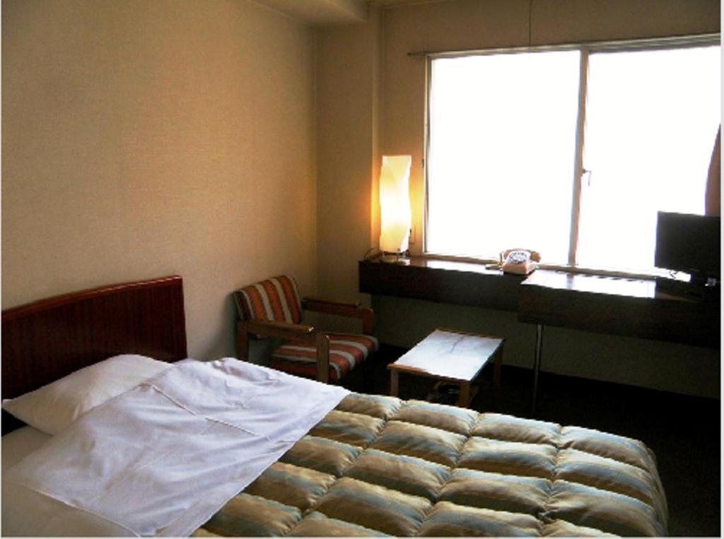 Business Hotel Tenmonkan Kagoshima Bagian luar foto